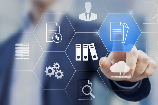 Hand selects a document icon on a digital interface