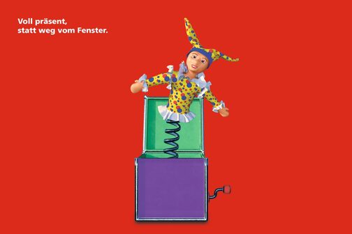 Clown springt aus der Box